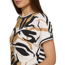 Load image into Gallery viewer, Woman wearing a patterned top with black, brown, and white design on a white background