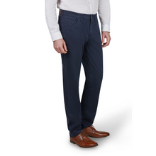 Load image into Gallery viewer, Navy pants worn by a person on a white background