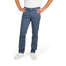Load image into Gallery viewer, Person wearing blue jeans and white shoes on a white background