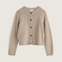 Load image into Gallery viewer, A cropped, long-sleeve knit cardigan sweater in a heathered oatmeal-beige color, featuring brown buttons down the front, displayed on a solid off-white background.
