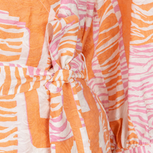 Load image into Gallery viewer, Close up of Esqualo Wrap Blouse Divine Blocks with a white background.