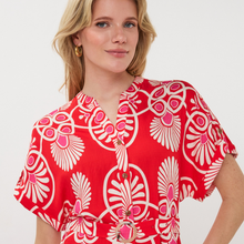 Load image into Gallery viewer, Woman wearing a red floral patterned dress on a white background