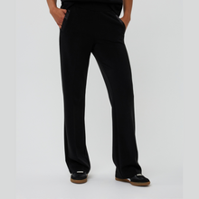 Load image into Gallery viewer, Person wearing black pants on a white background