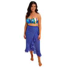 Load image into Gallery viewer, Woman wearing a colorful top and blue skirt on a white background