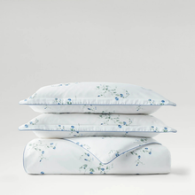 Load image into Gallery viewer, Set of floral-patterned pillows and duvet on a light gray background