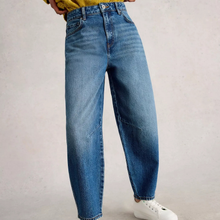 Load image into Gallery viewer, Blue jeans worn by a person on a plain background