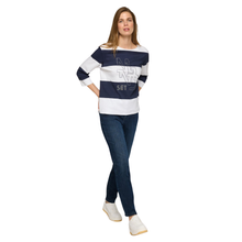 Load image into Gallery viewer, Model posing to the side while wearing Rabe 3/4 Sleeve Navy & White Top, with a white background.