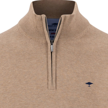 Load image into Gallery viewer, Close-up of a beige ribbed knit quarter-zip sweater with a small navy embroidered tree logo on the left chest, shown against a white background.
