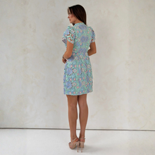 Load image into Gallery viewer, Woman in dress on light background