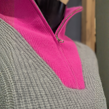 Load image into Gallery viewer, Close up of TWNS The Label Pearl Grey/Neon Pink, with a wooden and blue background.