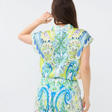 Load image into Gallery viewer, female model wearing esqualo ocean blouse in print colour with hand on hair
