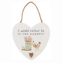Load image into Gallery viewer, Heart-shaped hanging sign with garden-themed illustrations and text on a white background