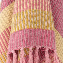 Load image into Gallery viewer, Close-up of a colorful woven fabric with pink and yellow patterns and tassels.