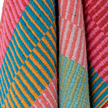 Load image into Gallery viewer, Close-up of colorful fabric with striped pattern