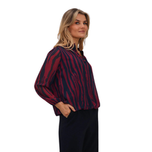 Load image into Gallery viewer, Model showcasing Kate & Pippa Blouse in Navy/Berry form a side view