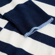 Load image into Gallery viewer, Close-up of a navy and white striped sweater with a pocket.