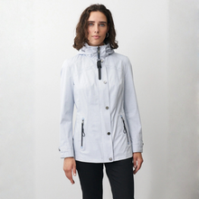 Load image into Gallery viewer, Woman wearing a light gray jacket on a white background