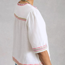 Load image into Gallery viewer, White blouse with colorful embroidery on a plain background