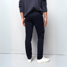 Load image into Gallery viewer, Person wearing a gray sweater, navy pants, and white shoes against a light gray background