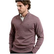 Load image into Gallery viewer, Man wearing a maroon sweater with a small logo on a white background