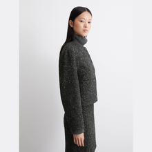 Load image into Gallery viewer, Person wearing a dark gray textured outfit on a white background