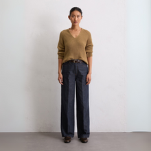 Load image into Gallery viewer, Woman wearing a brown sweater and dark pants against a white background