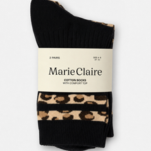 Load image into Gallery viewer, A pair of Marie Claire cotton socks with a leopard print comfort top, packaged with a cream paper band on a light gray background.