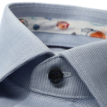 Load image into Gallery viewer, Close-up of a light blue shirt with a floral pattern inside the collar.