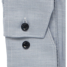 Load image into Gallery viewer, Close-up of a light blue textured shirt with black buttons.