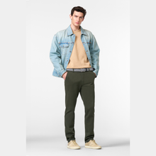 Load image into Gallery viewer, Man wearing a light blue denim jacket, beige sweater, green pants, and beige shoes on a white background
