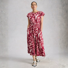 Load image into Gallery viewer, Lady in dress on grey background
