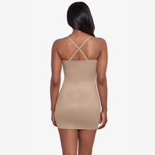 Load image into Gallery viewer, Woman wearing a beige strapless bodycontrol on a white background