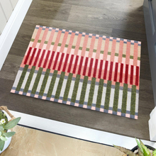 Load image into Gallery viewer, Image of My Mat Colour Block Weave placed in a hallway floor next to plants.