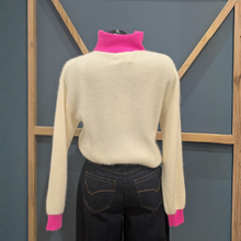 Load image into Gallery viewer, Back of Twns The Label Orleans Neon Pink/Yellow set on a mannequin, with a wooden and blue background.