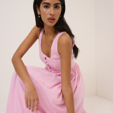 Load image into Gallery viewer, Woman wearing a pink dress against a plain background