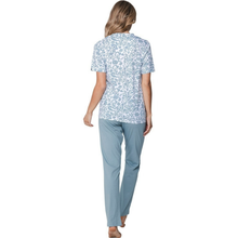 Load image into Gallery viewer, Woman wearing a light blue floral pajama top and pants on a white background