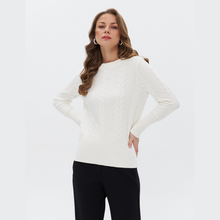 Load image into Gallery viewer, Cable knit jumper paired with black trousers on white background