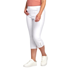 Load image into Gallery viewer, White capri pants worn by a person on a white background