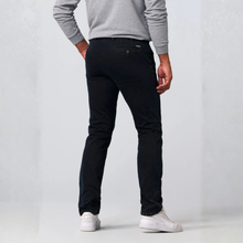 Load image into Gallery viewer, A man wearing slim-fit black jeans, a gray long-sleeve shirt, and white sneakers, shown from the back against a light gray studio background.