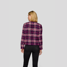 Load image into Gallery viewer, Person wearing a plaid shirt with a purple and pink pattern on a gray background