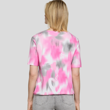 Load image into Gallery viewer, Person wearing a pink and gray tie-dye t-shirt on a plain background