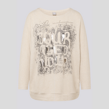 Load image into Gallery viewer, Beige sweatshirt with decorative text on a light gray background