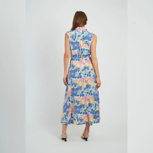 Load image into Gallery viewer, Woman wearing a floral dress on a white background