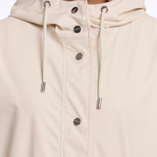 Load image into Gallery viewer, Close view of fabric and buttons on Rino & Pelle Reversible Raincoat in Birch Pink