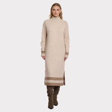 Load image into Gallery viewer, Woman wearing a long beige sweater dress with brown accents on a white background