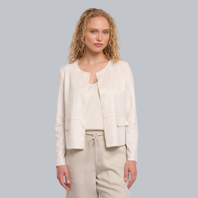 Load image into Gallery viewer, Woman wearing a light beige blazer and pants against a gray background