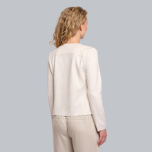 Load image into Gallery viewer, Woman wearing a beige jacket and pants on a gray background