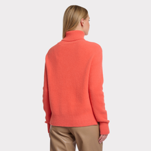 Load image into Gallery viewer, Person wearing a coral sweater on a white background