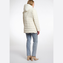 Load image into Gallery viewer, Person wearing a cream puffer jacket and light blue jeans on a white background