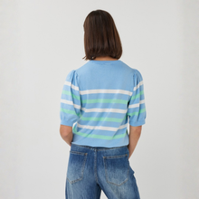 Load image into Gallery viewer, Person wearing a blue striped shirt with white and green stripes on a plain background